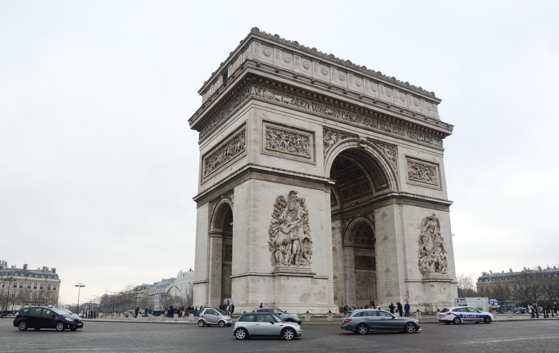 Arc de Triomphe and the Avenue des Champs-Élysées in the left part of the photo