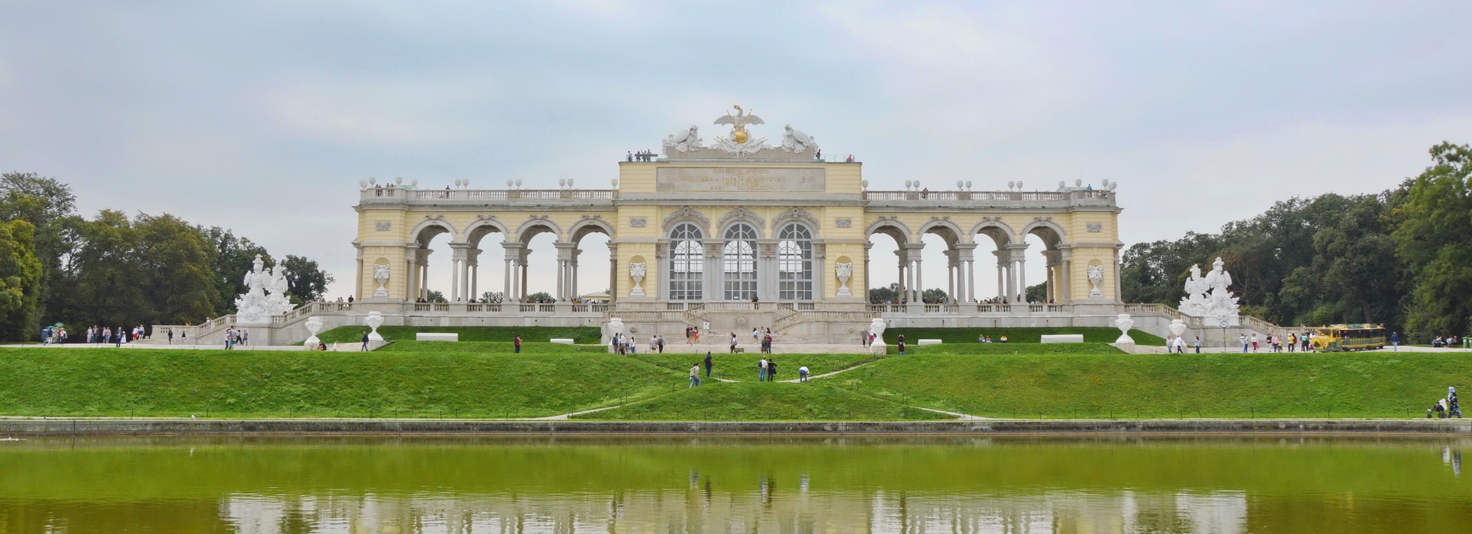 The Schönbrunn Gloriette stands on a hill above the Palace